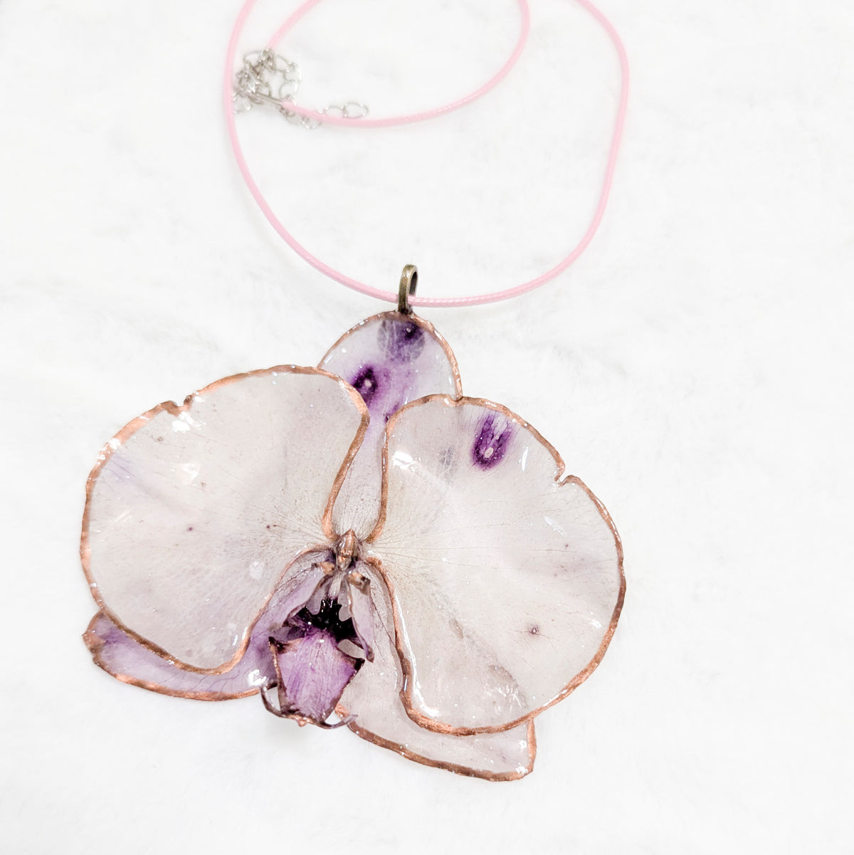 Unique Orchid Flower Resin Pendant Necklace – Copper-Edged Botanical Jewelry