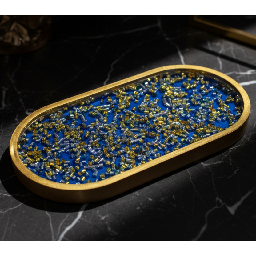 Royal blue resin tray on black marble surface